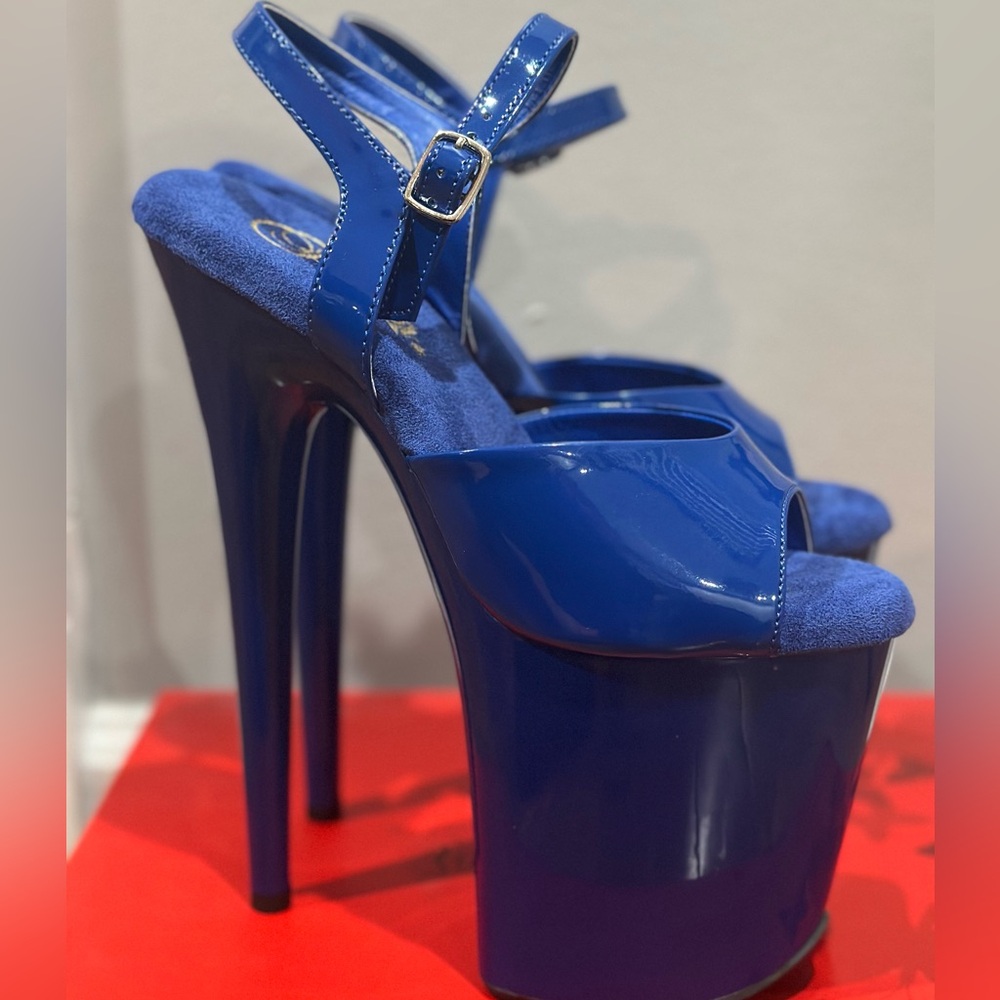 Pleaser Flamingo 809 Blue Size 7
NWOT